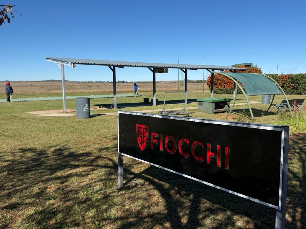 Fiocchi sponsor board and covered shooting stand on the Maccauw range