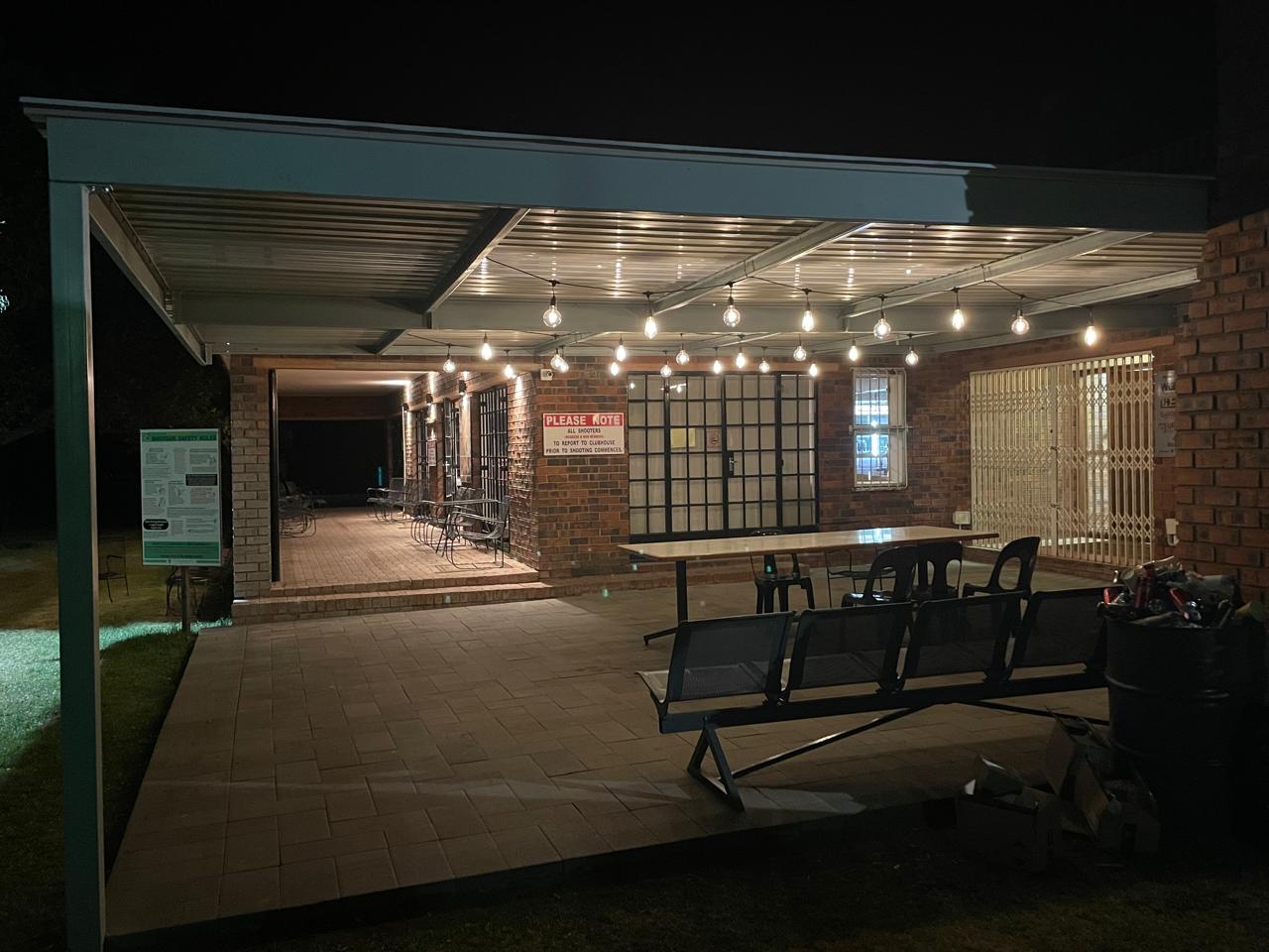 Club patio at night with festoon lighting