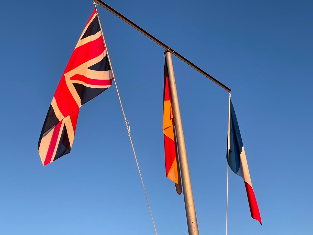 International flags flying at Maccauw