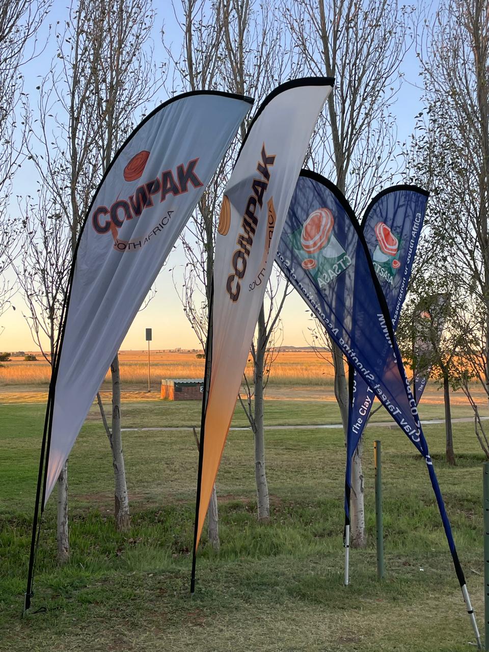 Compak and CTSASA banners at sunset