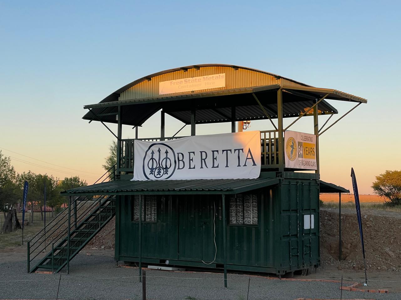 Beretta-branded viewing tower at sunset