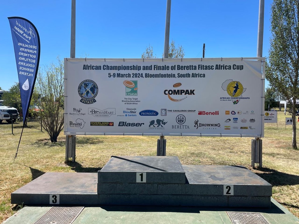 African Championship podium and sponsor banner