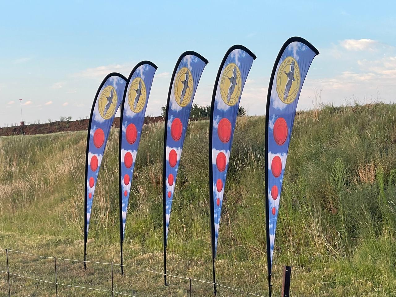 Maccauw branded teardrop flags along the course