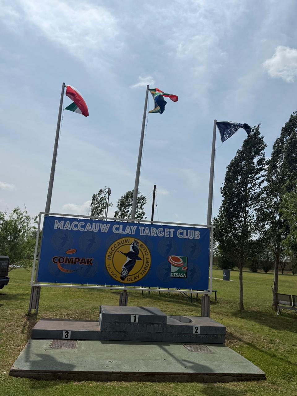 Maccauw Clay Target Club podium and club board