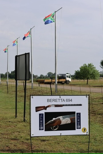 Flag line and sponsor boards at the entrance